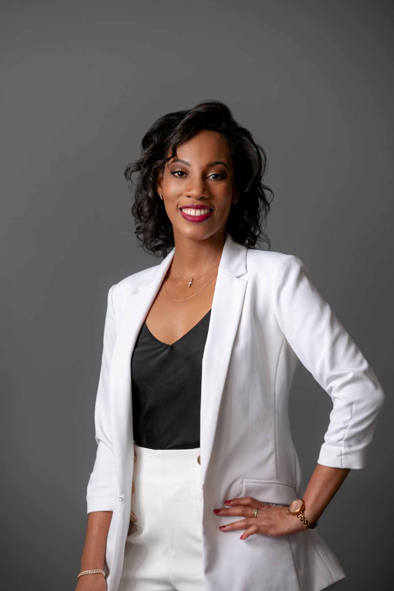 Kalina Bryant, customer-led growth executive, in a white blazer